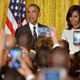 President Barack Obama speaks, as first lady Michelle Obama looks on, during a Black History Month reception in the East Room of the White House in Washington, D.C., on Feb. 18, 2016.
Mike Theiler-Pool/Getty Images